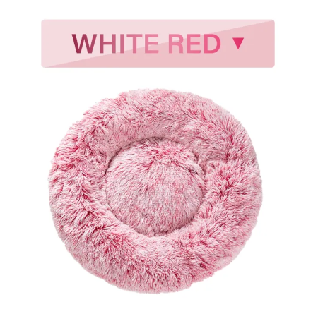 Pink and white fluffy donut pet bed, top view