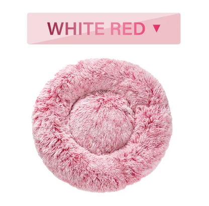 Pink and white fluffy donut pet bed, top view